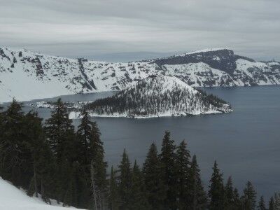 snow covered Crater Lake Wizard Island in winter